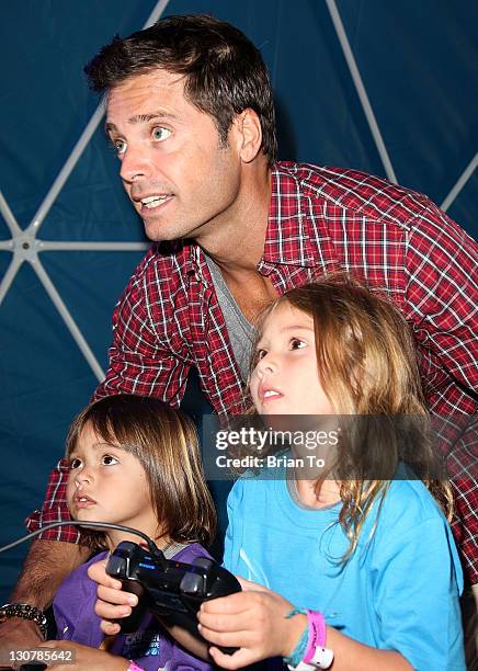 Actor David Charvet and his children Shaya Braven Charvet and Heaven Rain Charvet attend Activision's "Skylanders Spyro's Adventure" Halloween-themed...