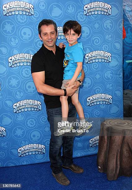 Of Activision Publishing Eric Hirshberg and son attend Skylanders Spyro's Adventure Halloween with Brooke Burke at The Grove on October 29, 2011 in...