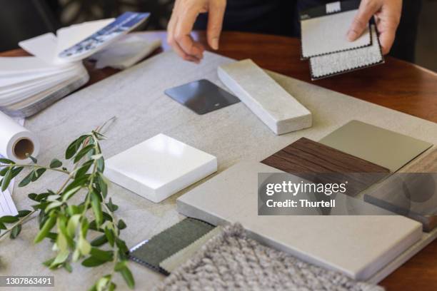 designer laying out a sample board - matter stock pictures, royalty-free photos & images