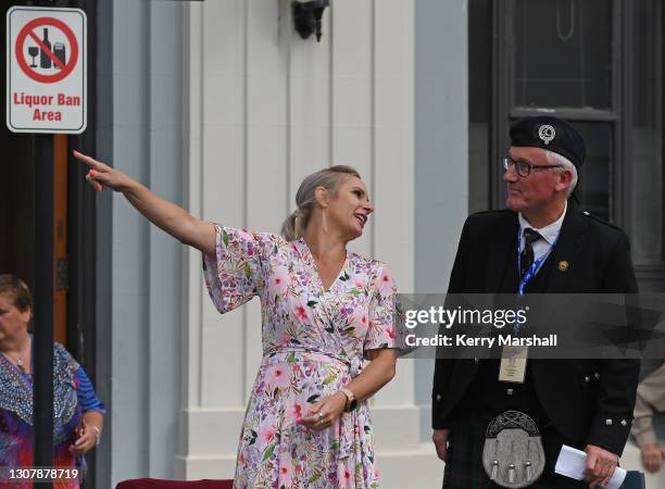 The Mayor of Napier Kirsten Wise and Royal NZ Pipe Band's Association President Iain Blakeley watch as bands parade during the street march...