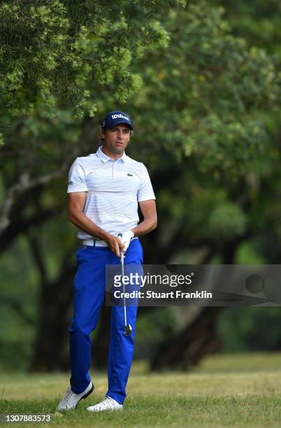 Benjamin Hébert of France plays his second shot on the 15th hole during Day Two of the Magical Kenya Open at Karen Country Club on March 19, 2021 in...