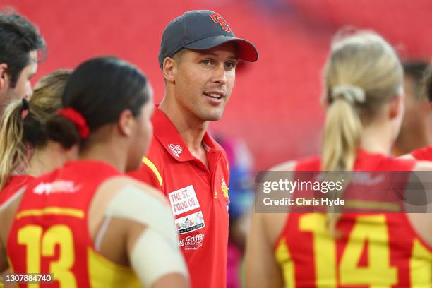 Suns Assistant coach Andrew Swallow during the round eight AFLW match between the Gold Coast Suns and the Carlton Blues at Metricon Stadium on March...