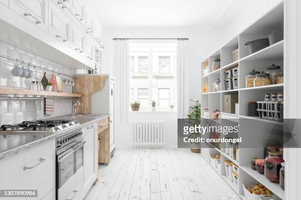 modern kitchen interior with white cabinets and organised pantry items, nonperishable food staples, preserved foods, healthy eating, fruits and vegetables in storage compartment. - arrangement stock pictures, royalty-free photos & images