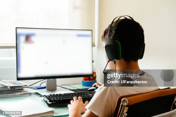 Student Behind Computer Student Behind Laptop Photos and Premium High Res Pictures - Getty Images