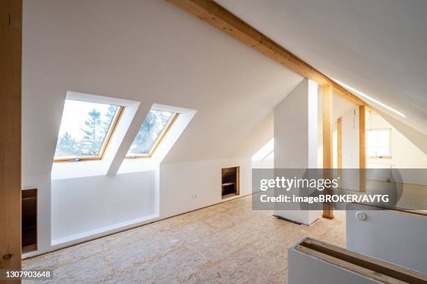 conversion of an attic into a spacious living area, germany - attic conversion stockfoto's en -beelden