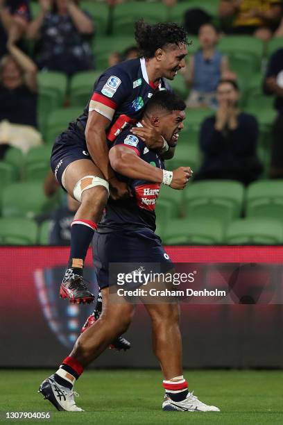 Jordan Ulese of the Rebels celebrates scoring a try during the round five Super RugbyAU match between the Melbourne Rebels and the NSW Waratahs at...