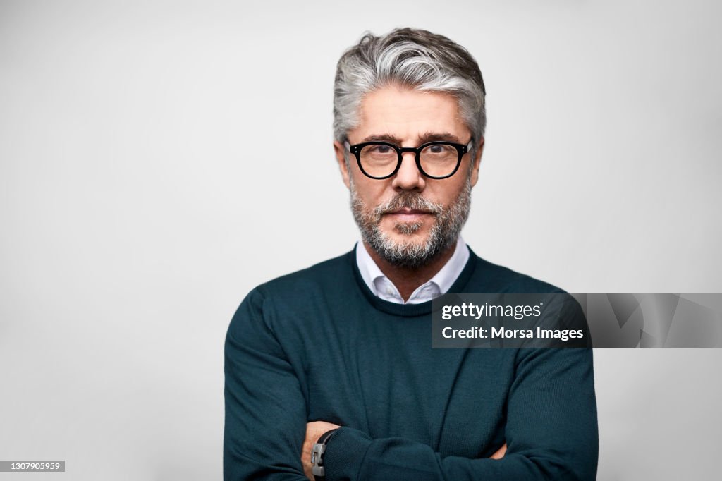 Latin American Male Entrepreneur Against White Background