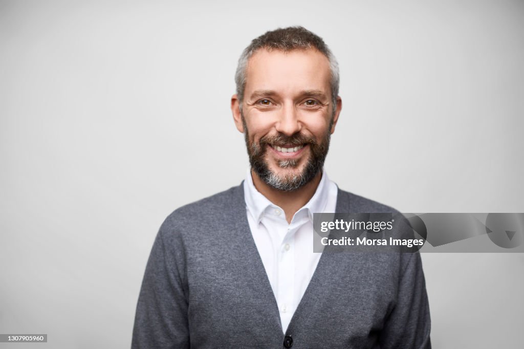 Latin American Businessman Against White Background
