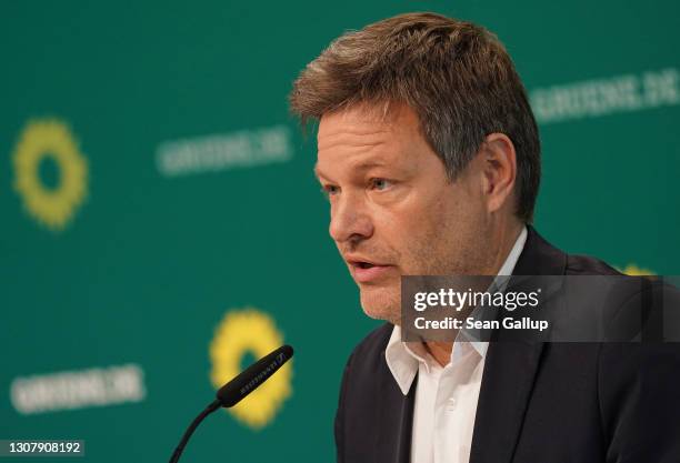 Robert Habeck and Annalene Baerbock , co-leaders of the German Greens Party, speak at a livestreamed, digital press conference to announce the...