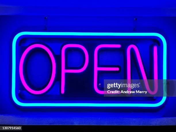 neon open sign at nightclub bar restaurant - purple bar stock pictures, royalty-free photos & images