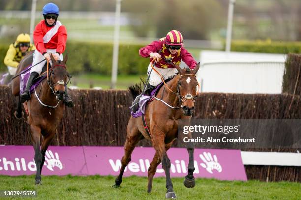 Jack Kennedy riding Minella Indo clear the last to win The WellChild Cheltenham Gold Cup Chase from Rachael Blackmore and A Plus Tard at Cheltenham...