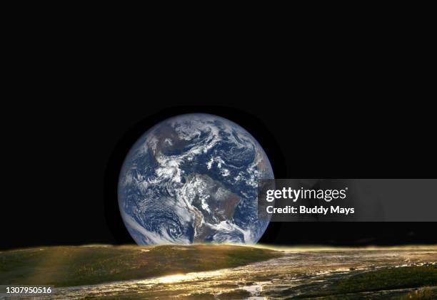 earth rising above moon's horizon - earthrise from moon stock pictures, royalty-free photos & images