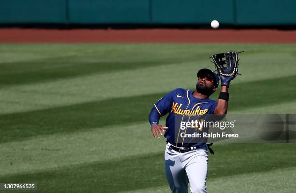 Center fielder Jackie Bradley Jr. #41 of the Milwaukee Brewers catches a fly ball out by Albert Pujols of the Los Angeles Angels during the fourth...