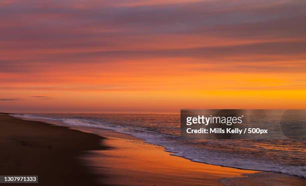 scenic view of beach against sky during sunset,bethany beach,delaware,united states,usa - bethany beach - fotografias e filmes do acervo