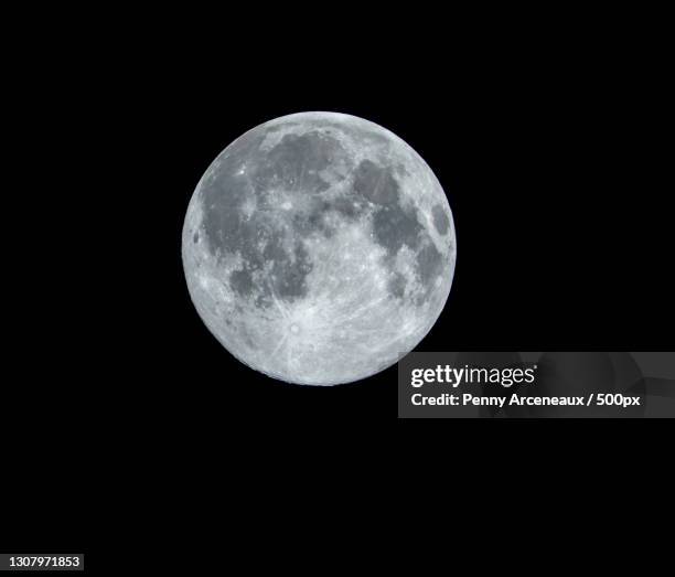 low angle view of moon against clear sky at night,louisiana,united states,usa - full moon stock pictures, royalty-free photos & images