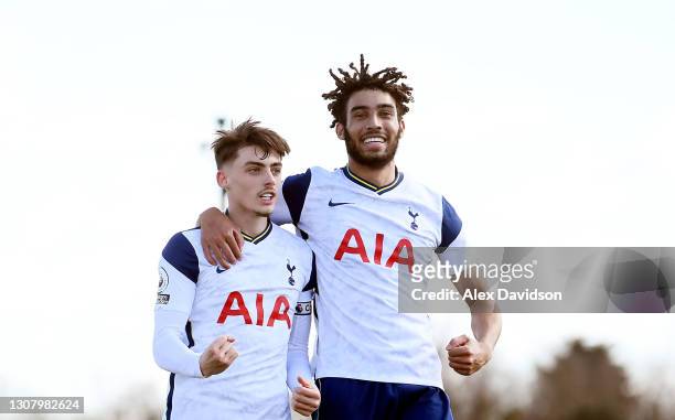 Jamie Bowden of Tottenham Hotspur celebrates with Kion Etete after scoring their sides first goal from the penalty spot during the Premier League 2...