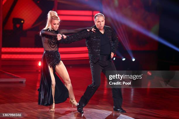 Kai Ebel and Kathrin Menzinger perform on stage during the 3rd show of the 14th season of the television competition "Let's Dance" on March 19, 2021...