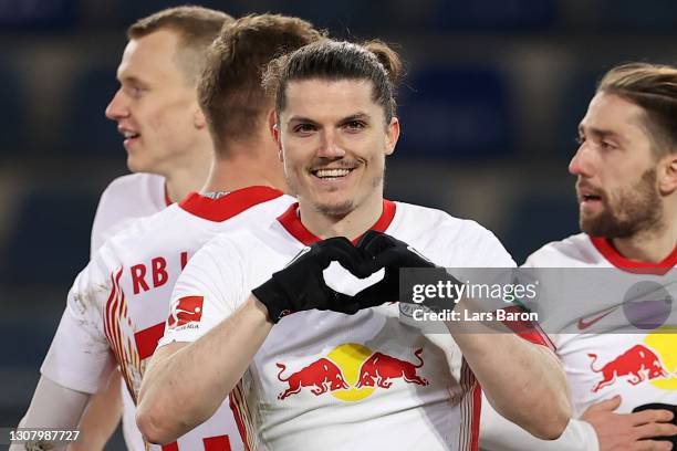 Marcel Sabitzer of Leipzig celebrates scoring the opening goal during the Bundesliga match between DSC Arminia Bielefeld and RB Leipzig at Schueco...