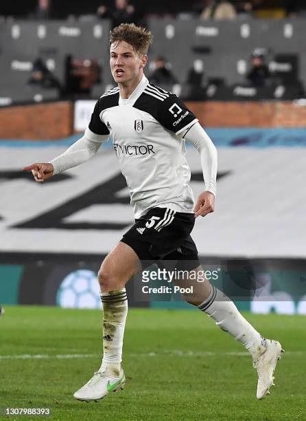 Joachim Andersen of Fulham celebrates after scoring their team's first goal during the Premier League match between Fulham and Leeds United at Craven...