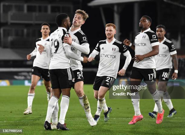 Joachim Andersen of Fulham celebrates with teammates Michael Hector, Ademola Lookman, Harrison Reed, Ivan Cavaleiro and Mario Lemina of Fulham after...