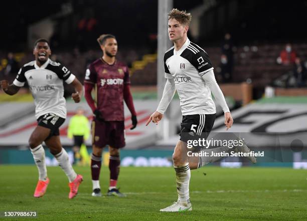 Joachim Andersen of Fulham celebrates after scoring their team's first goal during the Premier League match between Fulham and Leeds United at Craven...