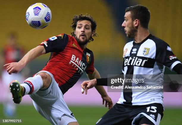 Mattia Destro of Genoa CFC and Mattia Bani of Parma Calcio in action during the Serie A match between Parma Calcio and Genoa CFC at Stadio Ennio...