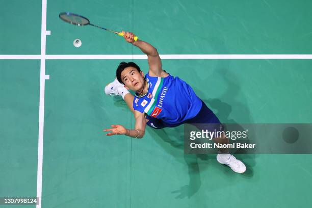 Kento Momota of Japan in action during his Men's Singles quarter final match against Lee Zii Jia of Malaysia during day three of YONEX All England...