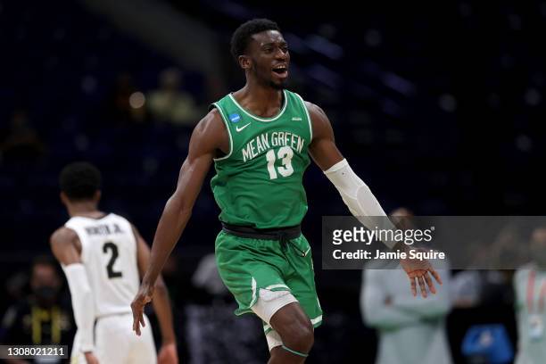 Thomas Bell of the North Texas Mean Green celebrates after beating the Purdue Boilermakers 78-69 in overtime in the first round game of the 2021 NCAA...
