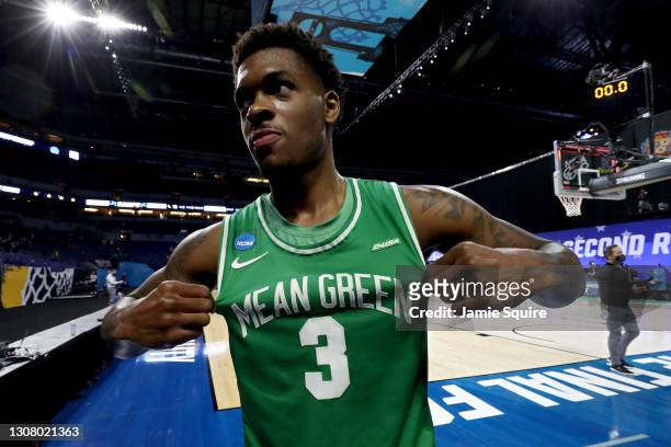 Javion Hamlet of the North Texas Mean Green celebrates after beating the Purdue Boilermakers 78-69 in overtime in the first round game of the 2021...