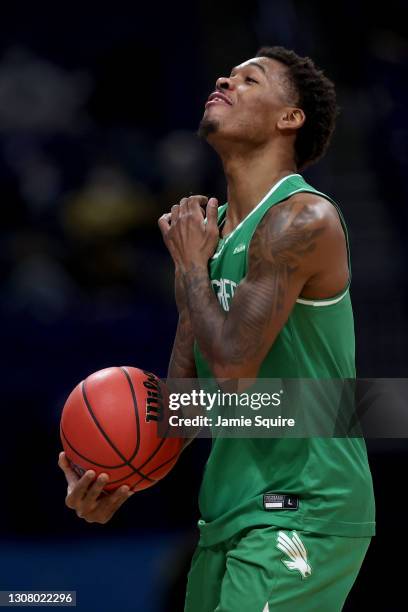 Javion Hamlet of the North Texas Mean Green celebrates after beating the Purdue Boilermakers 78-69 in overtime in the first round game of the 2021...