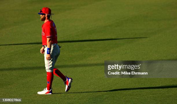 Bryce Harper of the Philadelphia Phillies looks on during a Spring Training game against the Philadelphia Phillies at George M. Steinbrenner Field on...