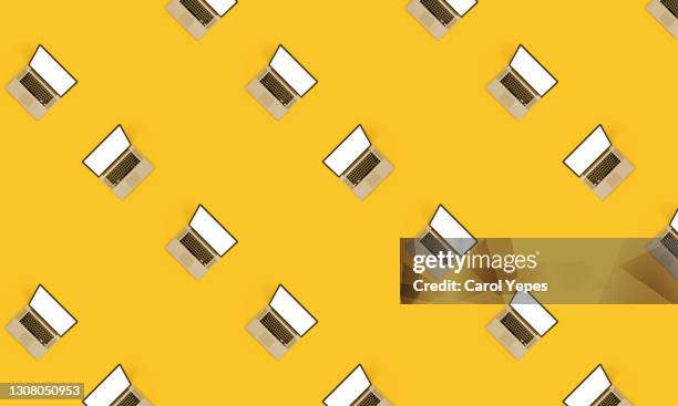 laptop computer from above seamless pattern in yellow background - variation stock illustrations stock pictures, royalty-free photos & images