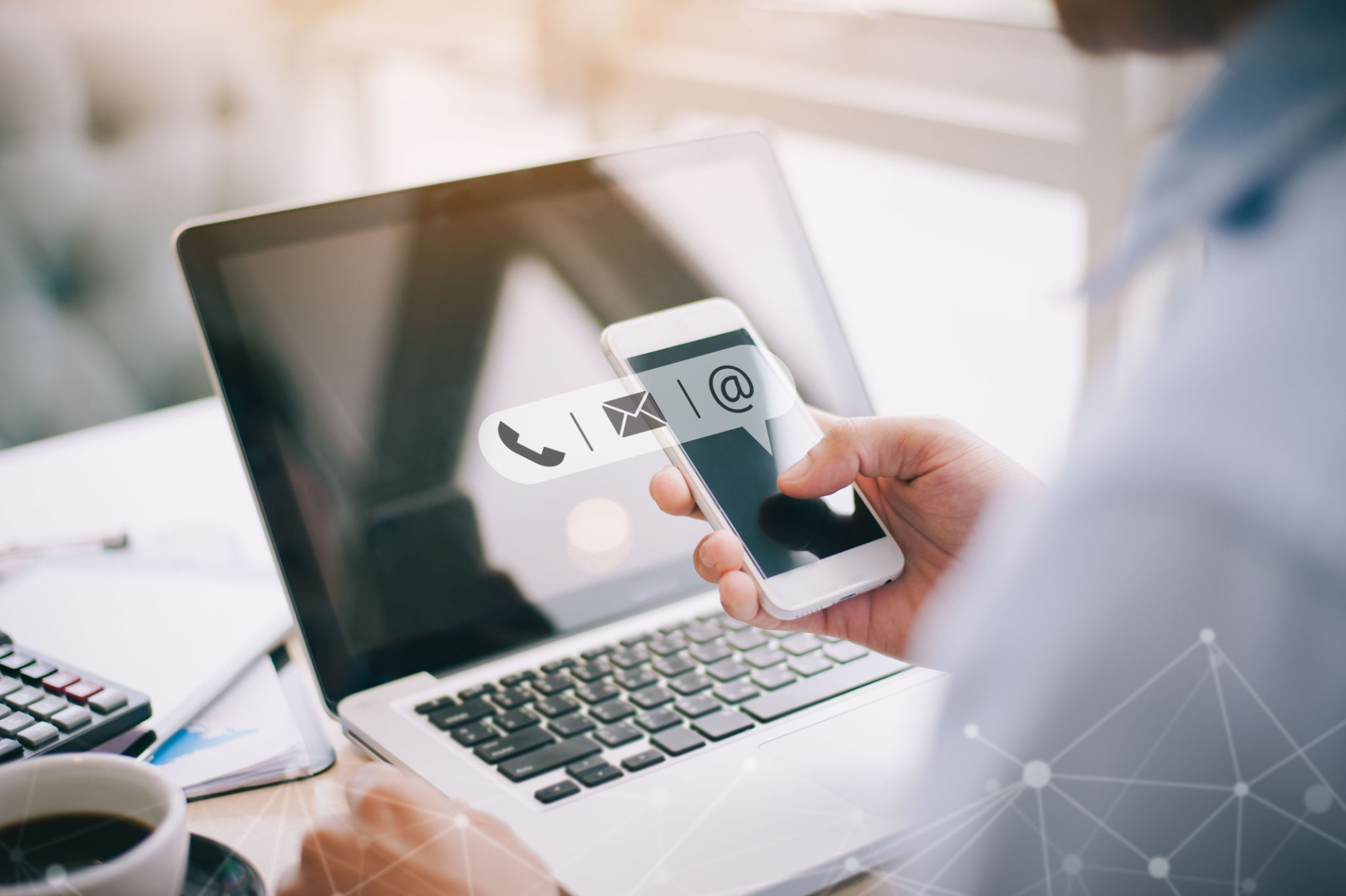 Hand of Businessman holding mobile smartphone with ( mail,phone,email ) icon. customer support concept, copy space Hand of Businessman holding mobile smartphone with ( mail,phone,email ) icon. customer support concept, copy space