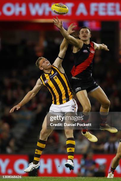 Sam Draper of the Bombers and Ben McEvoy of the Hawks contest the ruck during the round one AFL match between the Essendon Bombers and the Hawthorn...