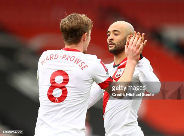 Nathan Redmond of Southampton celebrates with James Ward-Prowse after scoring their team's third goal during The Emirates FA Cup Quarter Final match...