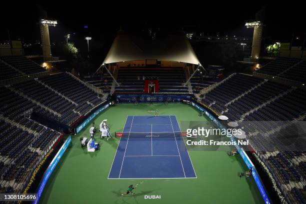 Lloyd Harris of South Africa returns the ball during the men's singles Final match against Aslan Karatsev of Russia during day fourteen of the Dubai...