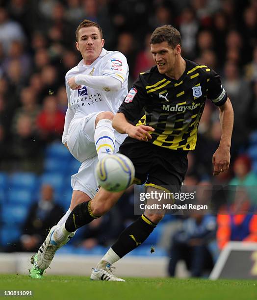 Ross McCormack of Leeds in action with Mark Hudson of Cardiff during the npower Championship match between Leeds United and Cardiff City at Elland...