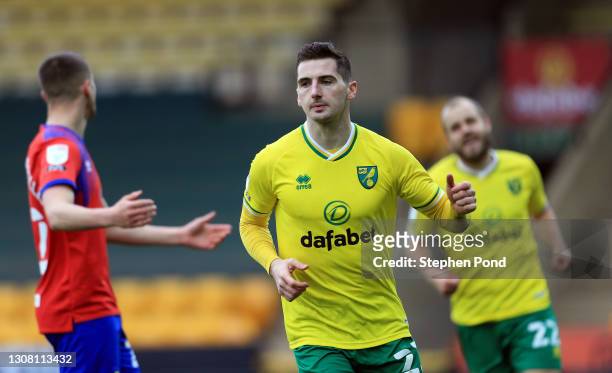 Kenny McLean of Norwich City celebrates after scoring their team's first goal during the Sky Bet Championship match between Norwich City and...