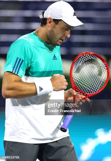 Aslan Karatsev of Russia celebrates during the men's singles Final match against Lloyd Harris of South Africa during day fourteen of the Dubai Duty...