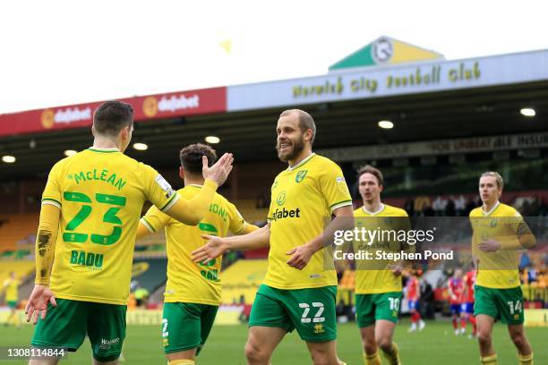 Kenny McLean of Norwich City celebrates scoring the opening goal during the Sky Bet Championship match between Norwich City and Blackburn Rovers at...