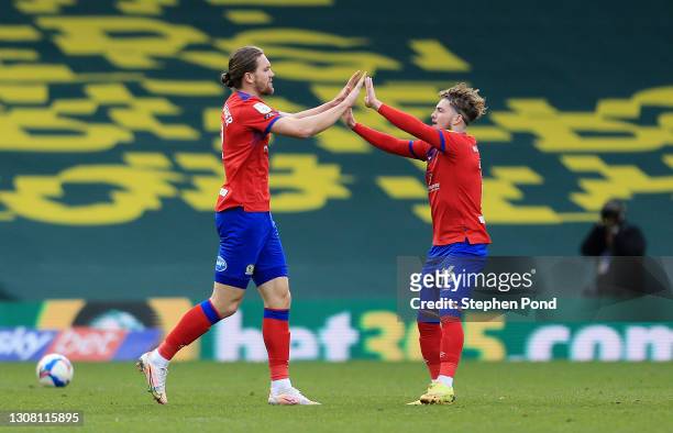 Sam Gallagher of Blackburn Rovers celebrates with Harvey Elliott after scoring their team's first goal during the Sky Bet Championship match between...
