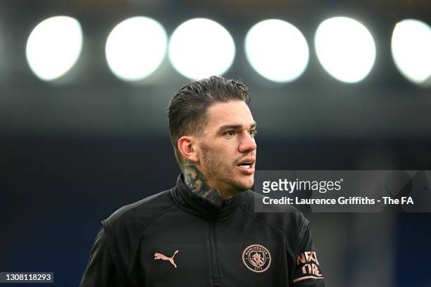 Ederson of Manchester City looks on during the warm up prior to The Emirates FA Cup Quarter Final match between Everton v Manchester City at Goodison...