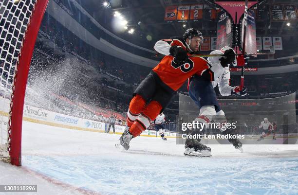 Andy Andreoff of the Philadelphia Flyers skates atop the crease against the Washington Capitals at the Wells Fargo Center on March 13, 2021 in...