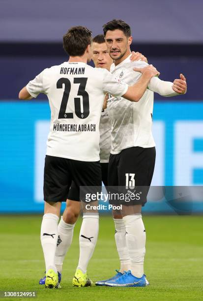 Lars Stindl of Borussia Moenchengladbach celebrates with team mate Jonas Hofmann after scoring their side's first goal during the Bundesliga match...