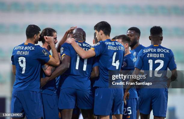 Mousa Marega of FC Porto celebrates his first goal with team mates during the Liga NOS match between Portimonense SC and FC Porto at Estadio...