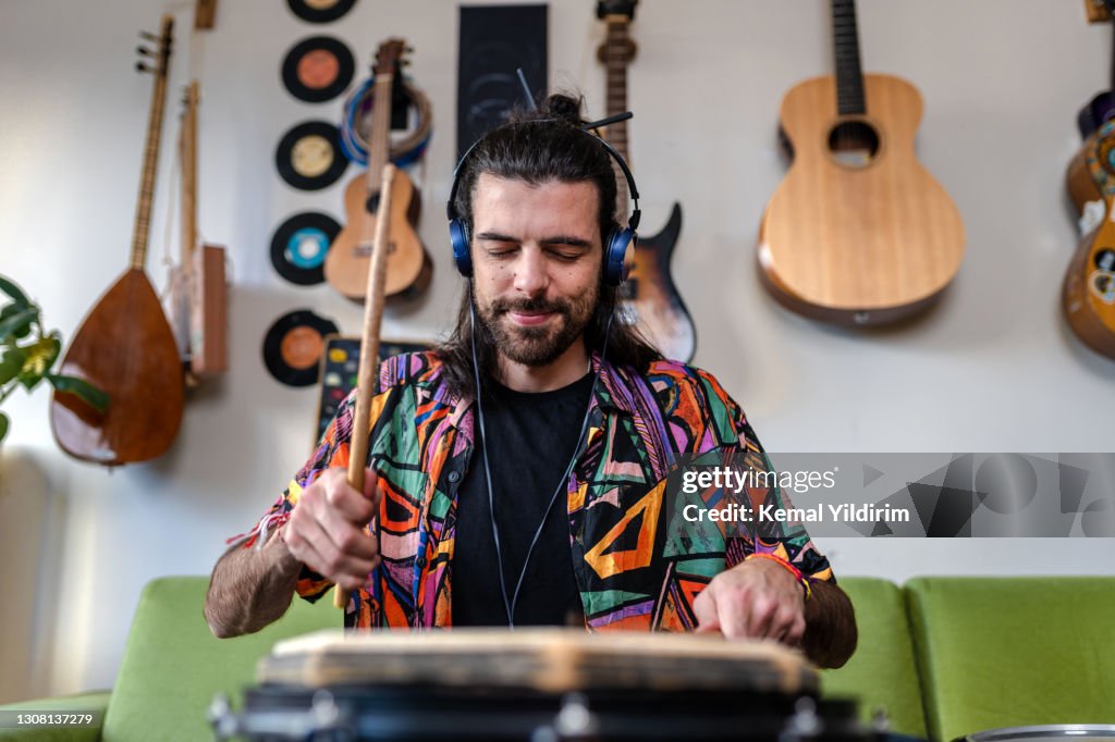 Millennial Drummer set up his drum for online concert