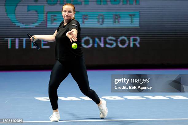 Alla Kudryavtseva of Russia and Oksana Kalashnikova of Georgia playing doubles during their match against Kaitlyn Christian of the United States and...