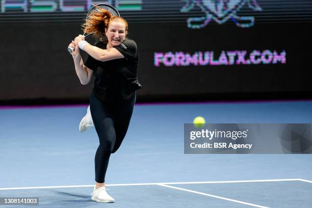 Alla Kudryavtseva of Russia and Oksana Kalashnikova of Georgia playing doubles during their match against Kaitlyn Christian of the United States and...