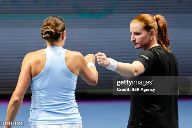 Oksana Kalashnikova of Georgia and Alla Kudryavtseva of Russia playing doubles during their match against Kaitlyn Christian of the United States and...