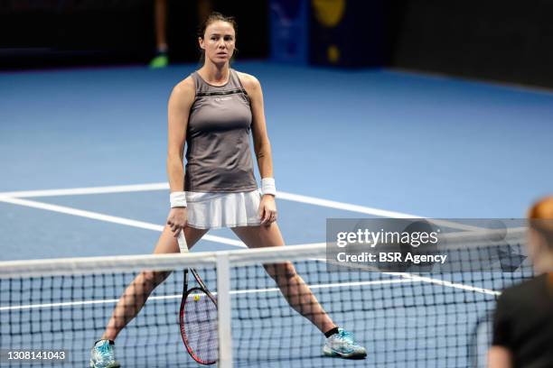 Kaitlyn Christian of the United States and Sabrina Santamaria of the United States playing doubles during their match against Oksana Kalashnikova of...